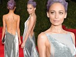 Ultra-slim Nicole Richie flashes side-boob at Met Gala in grey velvet Donna Karan gown
