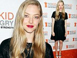 On display: Amanda Seyfried showed off her toned legs in a shimmering black dress as she attended Share Our Strength's No Kid Hungry Culinary Spring Dinner at Burato in New York City Tuesday