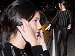 Embracing her dark side! Kendall Jenner takes on the night in an all-black ensemble