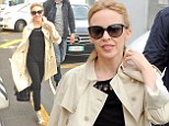 Jet-setter Kylie Minogue leaves Italy in chic trench coat after sexy performance on The Voice