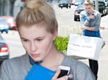 Ireland Baldwin steps out for first time since THOSE Angel Haze kissing pics to shop at Marc Jacobs