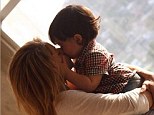Mother's love: Shakira shared a heartwarming snap of her kissing her 15-month-old son Milan on Sunday in honour of Mother's Day