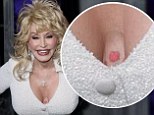 Coat Of Many Colors? Dolly Parton's breasts and arms are 'secretly covered in tattoos'