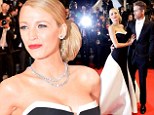 The couple that dresses together... Blake Lively wears glamorous black and white gown to Cannes premiere as Ryan Reynolds matches her in dapper tuxedo