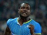 Over the line: American sprinter Justin Gatlin (second from left) wins the 100m at the Diamond League meeting in Shanghai