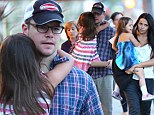 Family first: Matt Damon bonded with his daughter Isabella, left, wife Luciana, far right, and daughter Gia, second right, in Beverly Hills, California on Saturday
