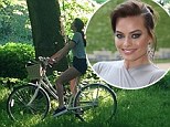 It's the simple things! Margot Robbie shows off her slender legs as she basks in the splendour of nature while taking a bike ride