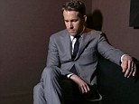 Ryan Reynolds steals spotlight back from wife Blake Lively as he smoulders in official Cannes portrait after revealing couple cut short African honeymoon for film role
