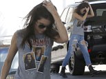 Kendall Jenner fills up her car with petrol