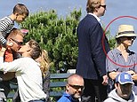 Awkward! Tom Brady plants a big kiss on wife Gisele Bundchen as they flaunt their love in front of ex Bridget Moynahan