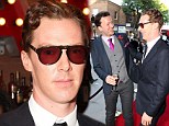 Sherlock would have something to say about that! Benedict Cumberbatch keeps 1970s-style shades on inside as he arrives at Park Theatre gala