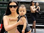 Kim Kardashian steps out with baby North