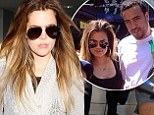 Not enough sleep? Khloe Kardashian looked rather tired and disheveled as she jet back into LAX on Friday