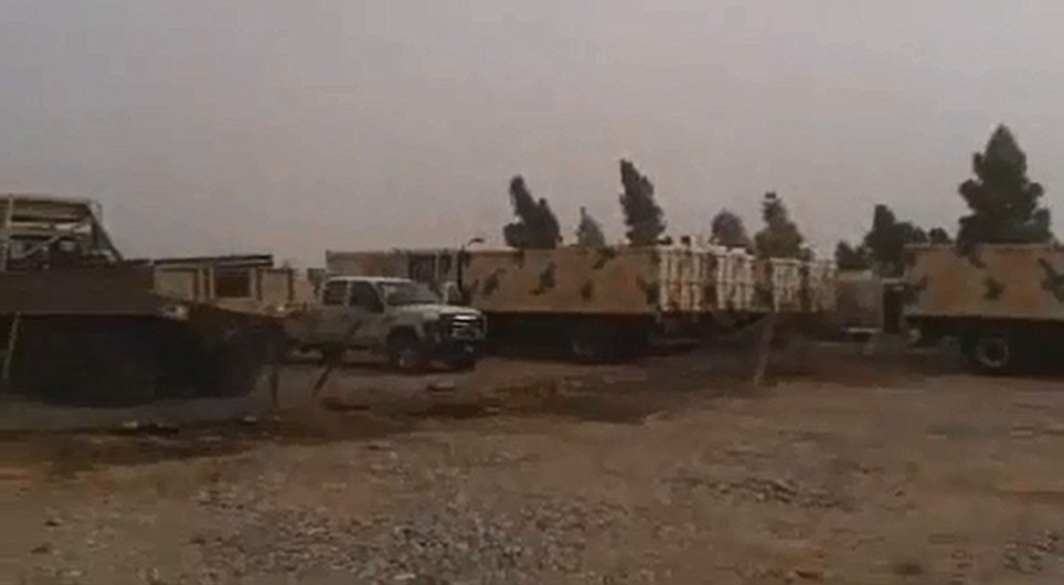The yard, which has apparently been captured by ISIS militants, also contains patrols cars and trucks that appear to have been taken from Iraqi forces