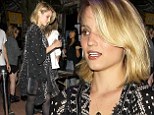 Back in black: Dianna Agron wore a black robe covered in exotic white designs over a lacy black nightie style dress to catch a Jack White concert in LA on Wednesday night