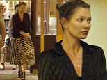 Kate Moss looks effortlessly chic in monochrome dress and black blazer as she dines with friends in Italy