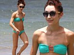 Meryl Davis raises temperatures at the beach in a tiny strapless bikini during Hawaiian holiday