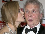 Pucker up! Daddy's girl Nicole Kidman plays the doting daughter as she gives her father Anthony a kiss on red carpet
