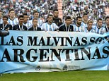 Message: Argentina players held up a banner saying 'The Falklands are Argentine' before their 2-0 friendly win over Slovenia on Saturday