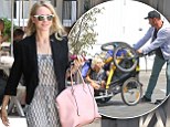 Glammed up Naomi Watts steps out looking stylish while her beau Liev Schreiber is left juggling the kids on babysitting duty