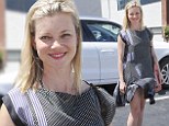 Marilyn moment: Amy Smart's dress got caught in the wind as she stepped out in Los Angeles on Thursday