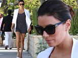 Petite Eva Longoria displays her incredibly toned legs in cute black and white polka-dot jumpsuit as she leaves hair salon to find pesky parking fine