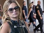 Kate Moss flanked by uniformed security as she films new Gucci advert in sexy keyhole cut black dress and PVC boots