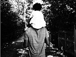 'Happy Happy Father's Day': Beyonce shares an adorable black and white snap of hubby Jay-Z carrying their daughter Blue Ivy on his shoulders