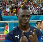 He knows the score: Mario Balotelli gestures '2-1' to the camera as he walks off at the end