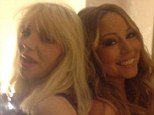 Collaboration in the works? Courtney Love poses with Mariah Carey as the Hole rocker shares an intimate snap of the pair