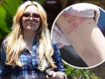 Erasing the past! A healthy and happy looking Amanda Bynes reveals she is removing another tattoo as she marks Father's Day with her loved ones