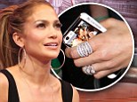 Newly divorced Jennifer Lopez promotes her album A.K.A. in NYC and proudly flaunts iPhone case featuring her twins