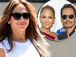Jennifer Lopez flashes big smile while stepping out in NYC... as it's revealed she recently finalized divorce from Marc Anthony THREE YEARS after split