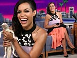Animal lover: Rosario Dawson was thrilled to hold a young albino alligator on Wednesday during her appearance on the The Tonight Show with Jimmy Fallon