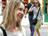 A make-up free Calista Flockhart goes (Hans) solo to the theatre in London while husband Harrison Ford continues to nurse his broken leg