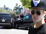 Justin Bieber involved in car crash outside Beverly Hills restaurant Mastro's where he took Selena Gomez on date just days ago