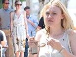Summer chic: Dakota Fanning opted to wear a floral frock as she stepped out in Los Angeles Monday