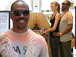 Now that's a pick-me-up! Eddie Murphy gets cosy with girlfriend Paige Butcher on their daily coffee run
