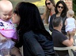 Baby's day out! Alec and Hilaria Baldwin treat their 10-month-old daughter to a family day in the Hamptons
