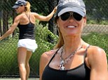 Raising a racket! Kelly Bensimon shows off her long legs in a tiny skirt as she works up a sweat playing tennis
