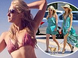 Paris Hilton, 33, throws on her bikini to go 'hit the waves' in Instagram snap after shopping trip with sister Nicky in Malibu