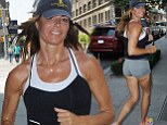 Not your usual housewife! Toned and tanned Kelly Bensimon, 46, works up a sweat on her morning jog through NYC