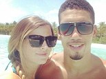 Soak up the sun: Chris Smalling poses with girlfriend Sam Cooke while on holiday after the World Cup