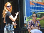 Sister act! Tallulah Willis goes retro in 'N Sync T-shirt ... as her Free The Nipple sibling Scout covers up in black crop top