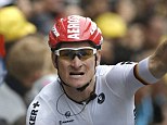 Elation: Germany's Andre Greipel crosses the finish line to win the sixth stage of the Tour de France