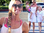 Mommy loves all of you! Denise Richards showers all three daughters with smiles and affection as they take a family stroll through Malibu