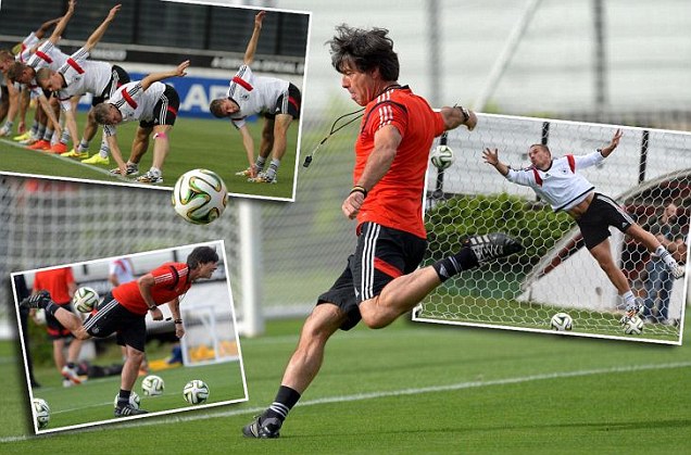 Raring to go: Joachim Low and his side looked relaxed ahead of their World Cup final against Argentina