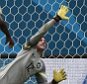 Cracker: Brazil goalkeeper Julio Cesar fails to save penalty from Robin van Persie in third minute