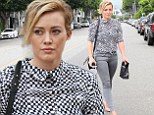 Gorgeous in grey: Hilary Duff showed off her shapely figure in grey skinny jeans while shopping at MAC cosmetics in Los Angeles on Monday