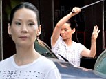 Plays a doctor on TV: Lucy Liu as Doctor Joan Watson filmed fight scenes on Tuesday in New York City for the CBS series Elementary